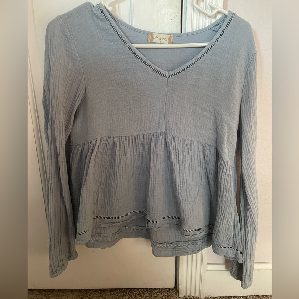 Altar’d state babydoll top in a light blue color